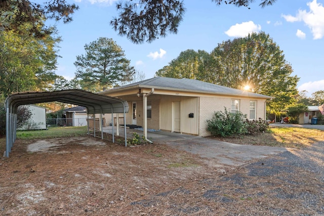 view of front of property with a carport