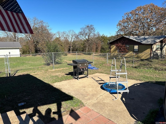 view of yard with a patio area