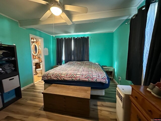 bedroom with ensuite bathroom, hardwood / wood-style flooring, ceiling fan, ornamental molding, and beam ceiling