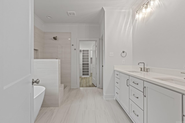 bathroom with separate shower and tub, vanity, and ornamental molding