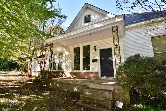 property entrance with a porch