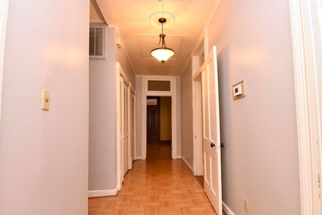 corridor with light parquet flooring