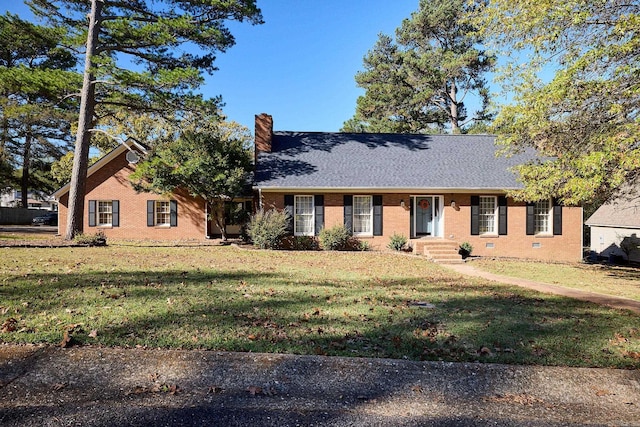 single story home with a front lawn