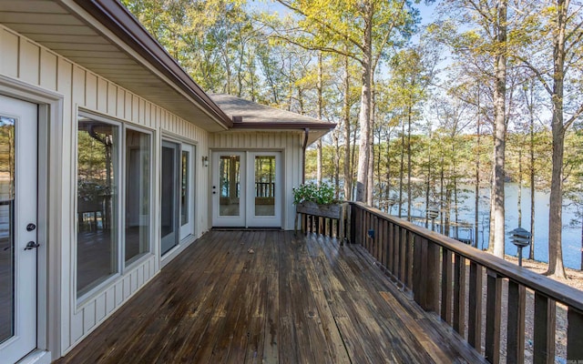 wooden deck with a water view