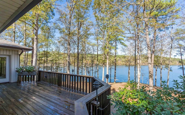 wooden terrace with a water view