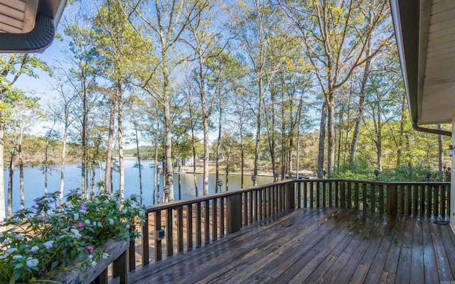 wooden deck with a water view