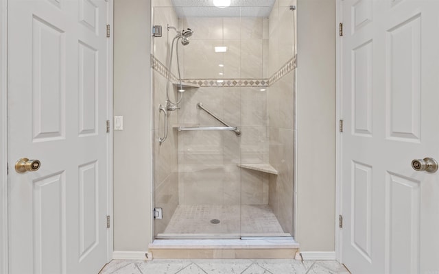 bathroom featuring tile patterned flooring and walk in shower