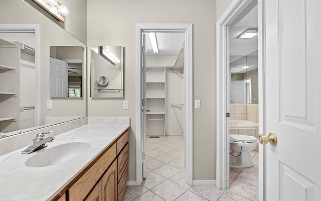 bathroom with tile patterned floors and vanity