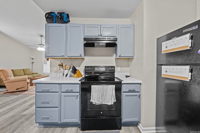 kitchen featuring black appliances, ceiling fan, gray cabinetry, and light wood-type flooring