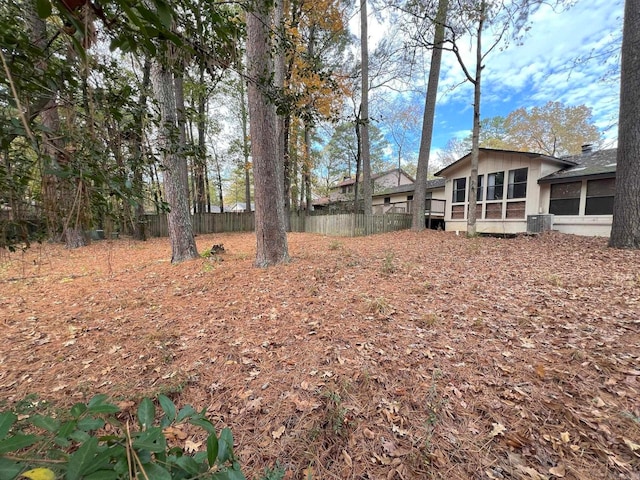 view of yard with central AC unit