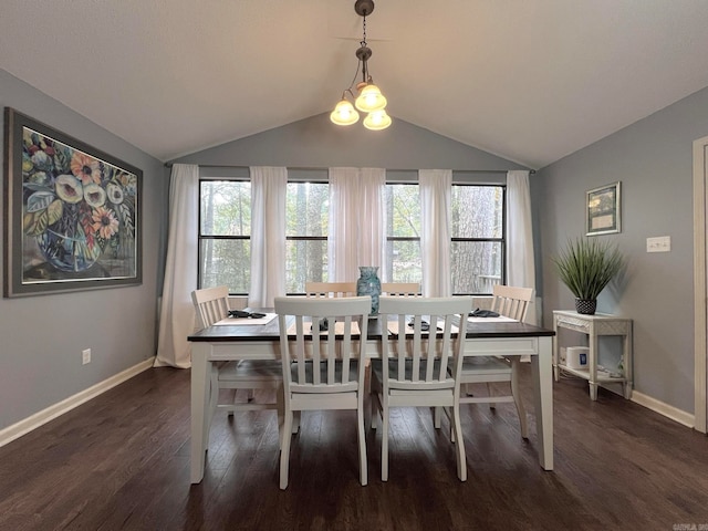 dining area featuring a notable chandelier, dark hardwood / wood-style flooring, and vaulted ceiling