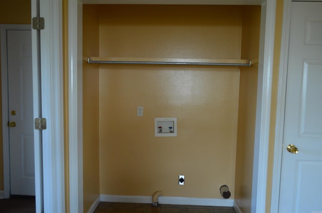 laundry area featuring tile patterned flooring, washer hookup, and hookup for an electric dryer