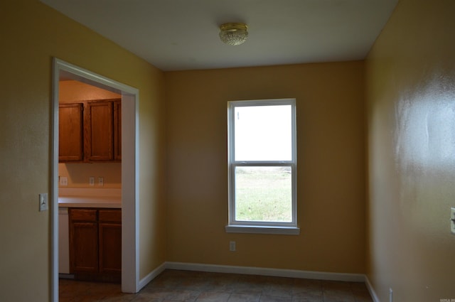 106 W Clinton, Heber Springs, AR 72543 - spare room with baseboards and light tile patterned floors