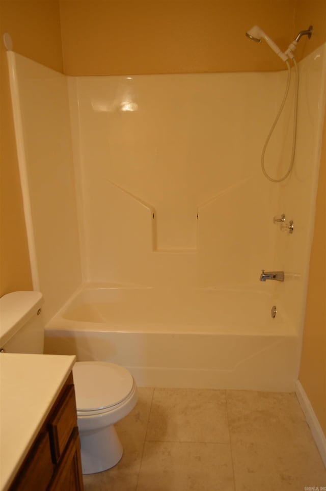 full bathroom featuring tile patterned floors, vanity, toilet, and tub / shower combination