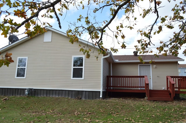 106 W Clinton, Heber Springs, AR 72543 - rear view of property with a deck and a yard