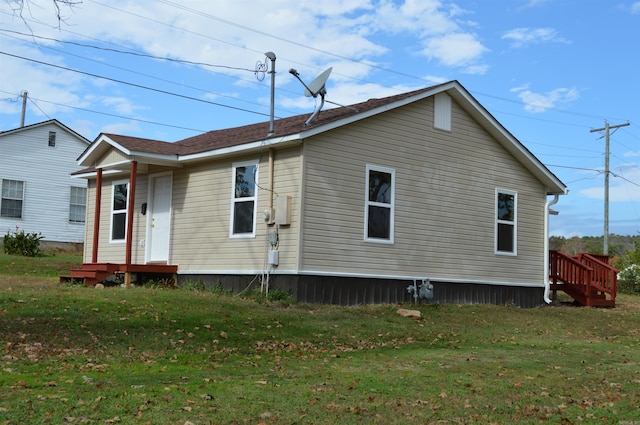 106 W Clinton, Heber Springs, AR 72543 - view of home's exterior featuring a lawn