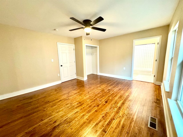 interior space featuring hardwood / wood-style floors and ceiling fan