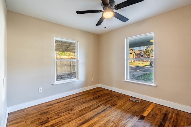 unfurnished room featuring hardwood / wood-style flooring and ceiling fan