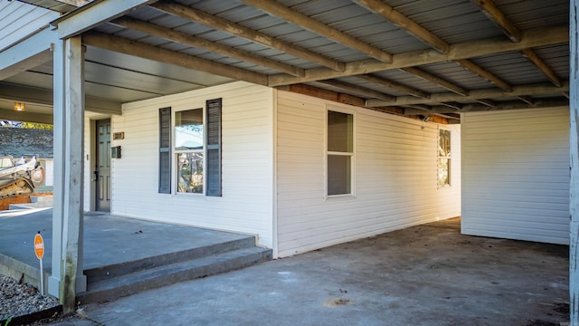 view of patio / terrace featuring a carport