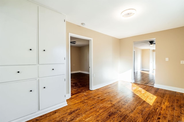 interior space featuring hardwood / wood-style flooring and ceiling fan