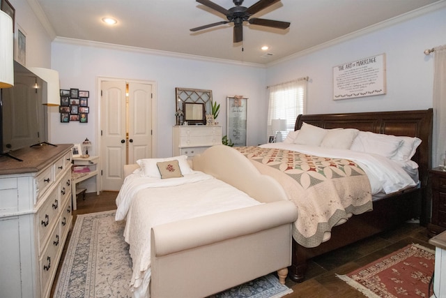 bedroom with ceiling fan, crown molding, and dark hardwood / wood-style floors