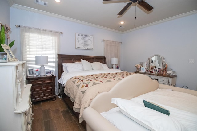 bedroom with dark hardwood / wood-style floors, ceiling fan, and ornamental molding