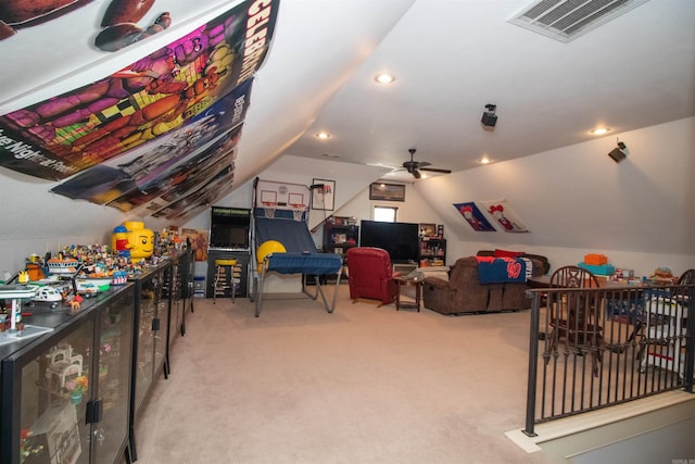 game room with light colored carpet, vaulted ceiling, and ceiling fan