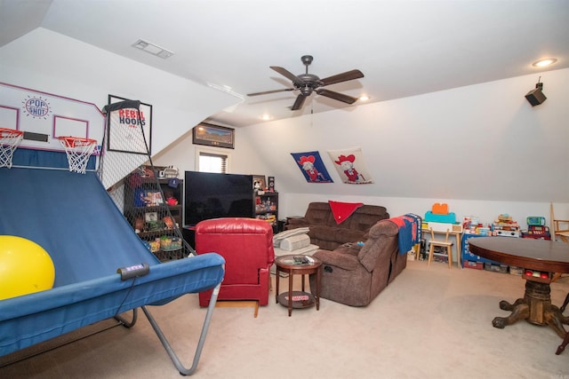 playroom featuring ceiling fan, carpet, and lofted ceiling