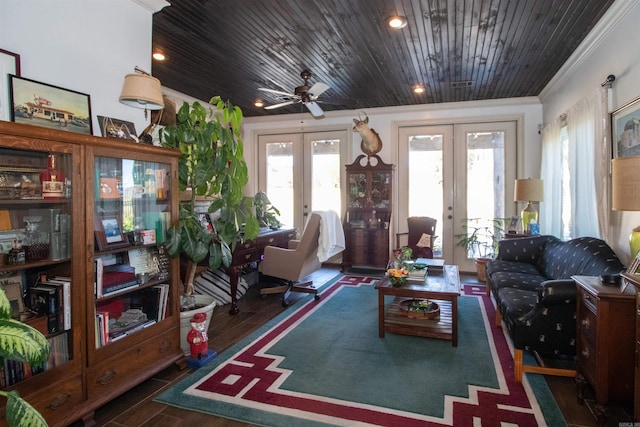 living room featuring ceiling fan, french doors, dark hardwood / wood-style flooring, crown molding, and wood ceiling