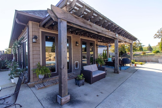 view of patio / terrace with a pergola and an outdoor hangout area