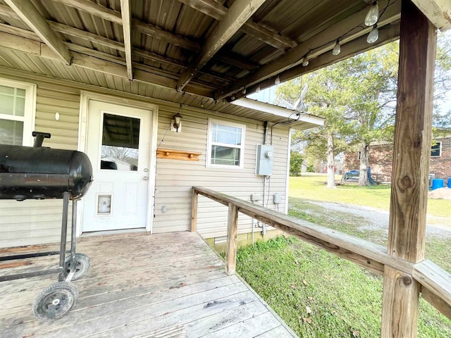 entrance to property with a wooden deck