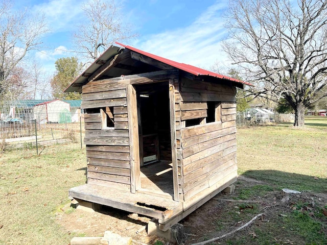 view of outdoor structure with a yard