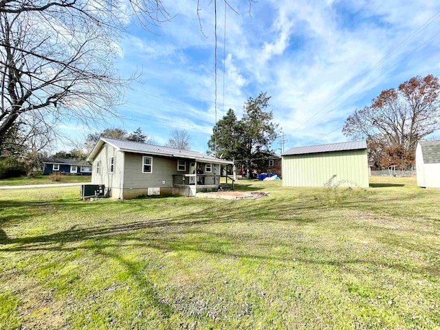 view of yard featuring central AC