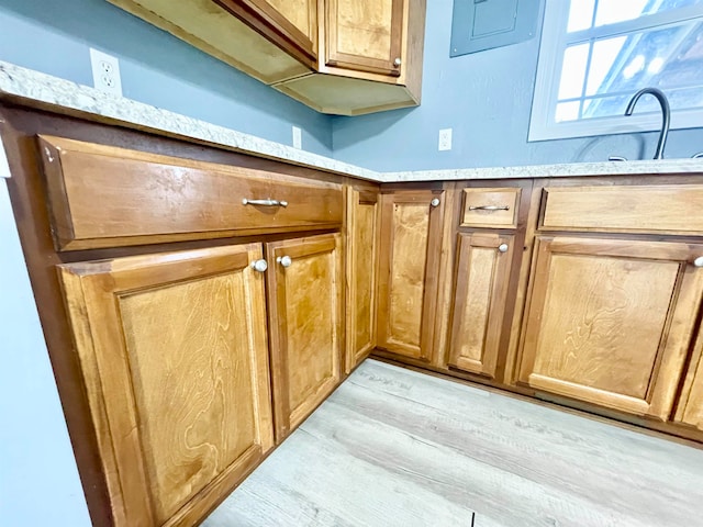 room details featuring wood-type flooring and sink