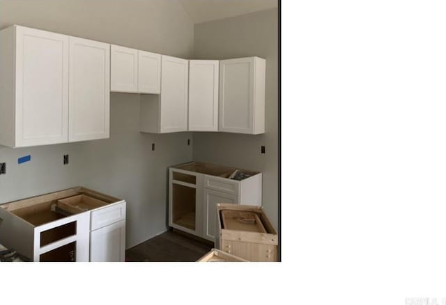 kitchen featuring white cabinetry