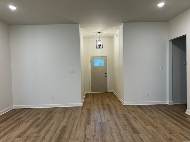 foyer entrance featuring hardwood / wood-style floors