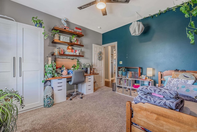 carpeted bedroom with ceiling fan