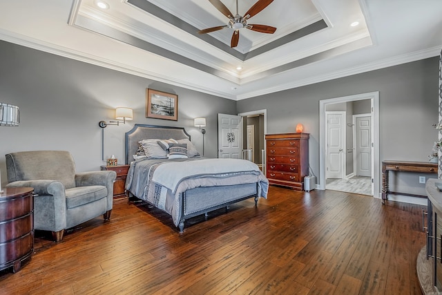 bedroom featuring ceiling fan, dark hardwood / wood-style flooring, and ornamental molding