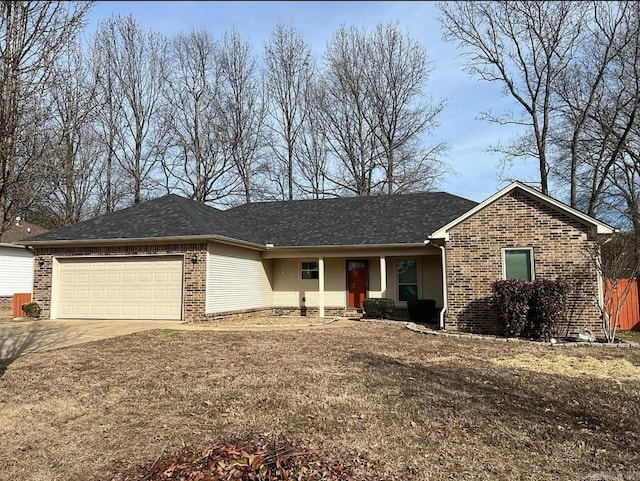 ranch-style home featuring a garage