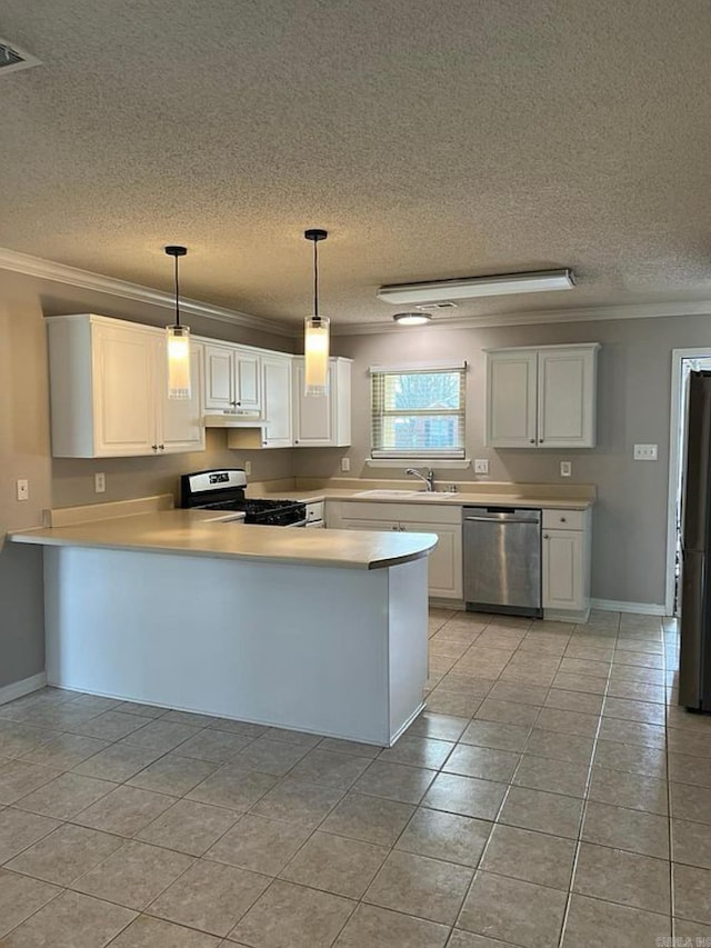 kitchen featuring pendant lighting, dishwasher, range with electric stovetop, and kitchen peninsula