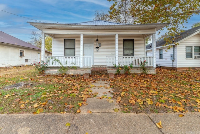 bungalow-style home with a porch