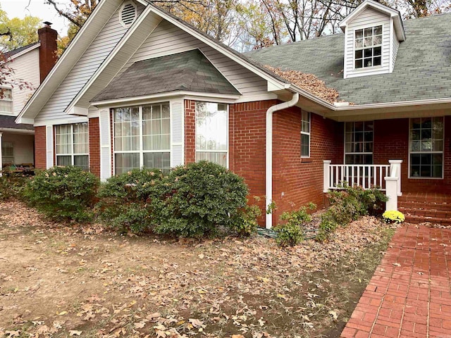 view of home's exterior featuring a porch