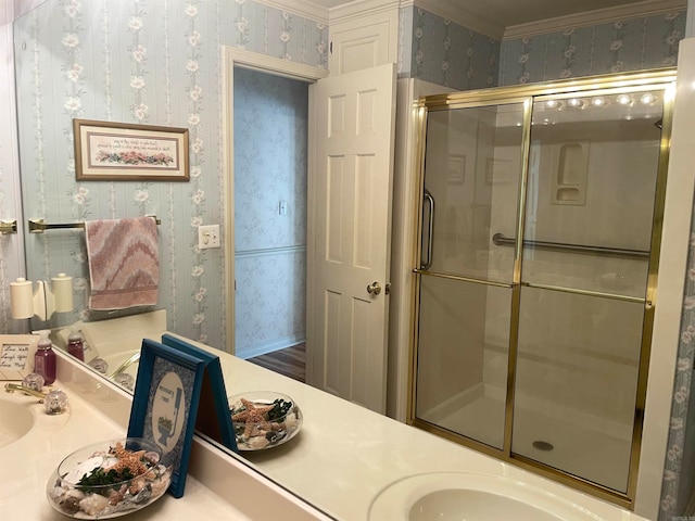 bathroom with vanity and a shower with shower door