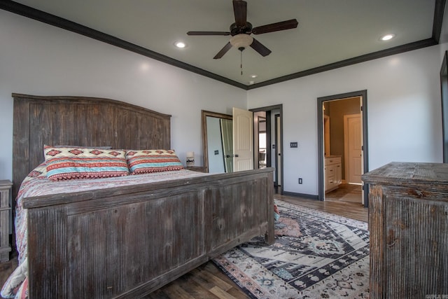 bedroom featuring dark wood-style floors, recessed lighting, crown molding, and baseboards