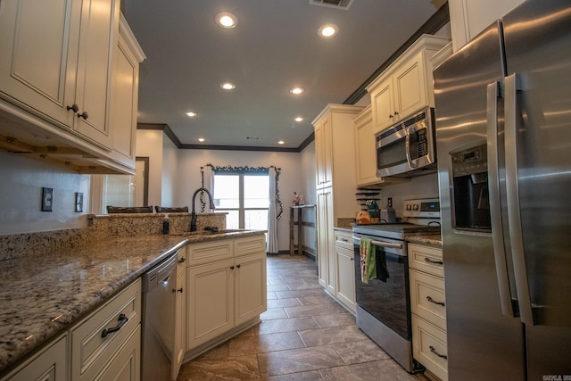 kitchen with stainless steel appliances, stone counters, recessed lighting, and crown molding