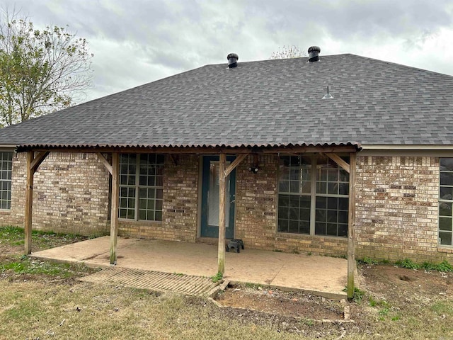 back of house featuring a patio area