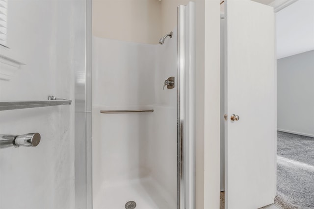 bathroom with an enclosed shower