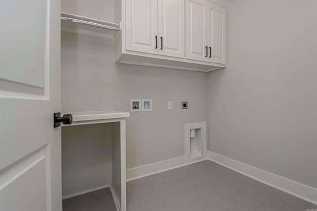 laundry area with cabinets, washer hookup, tile patterned flooring, and hookup for an electric dryer