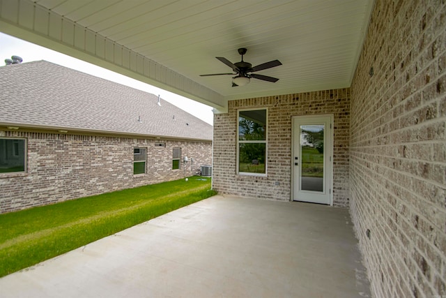 view of patio with central AC and ceiling fan