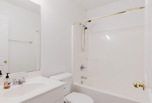 full bathroom with washtub / shower combination, vanity, and toilet